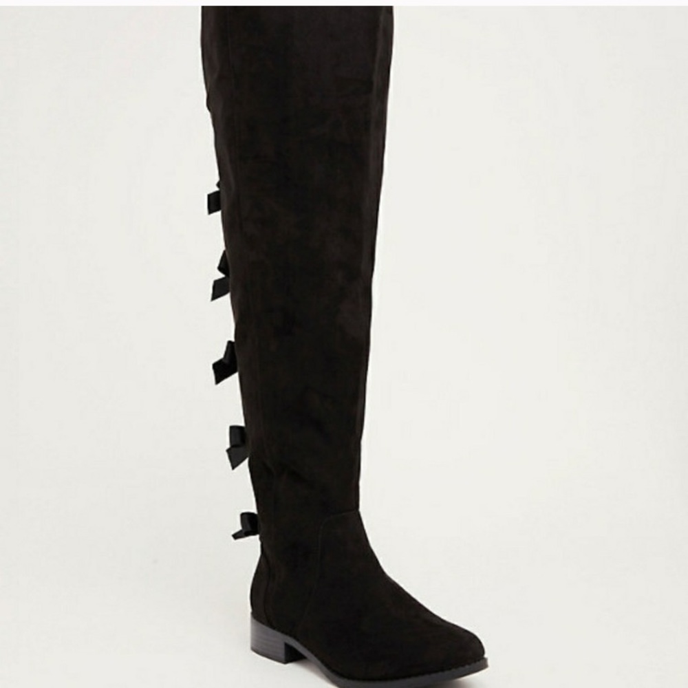 Black over the knee boots.